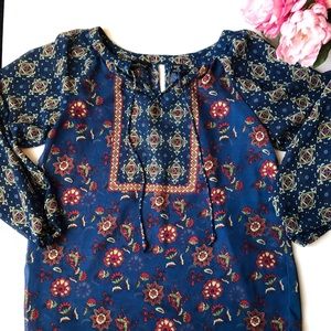 Angie blouse. 100% Polyester. New without tags.